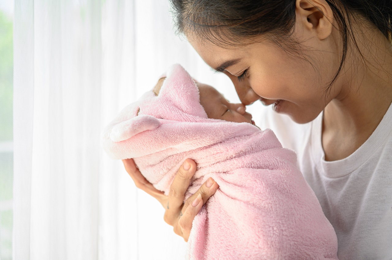A mom and her newborn baby