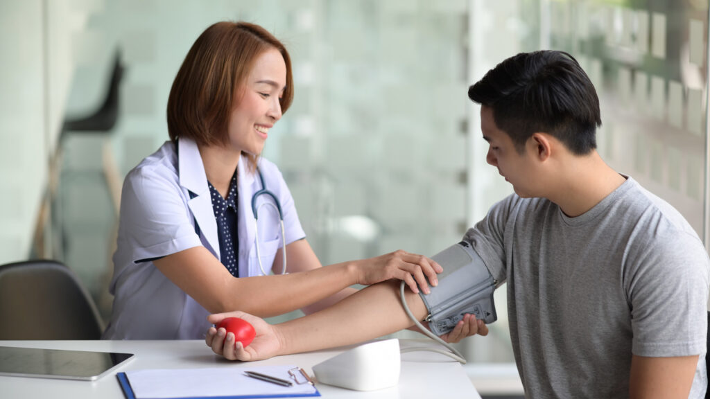 A man getting his blood pressure checked