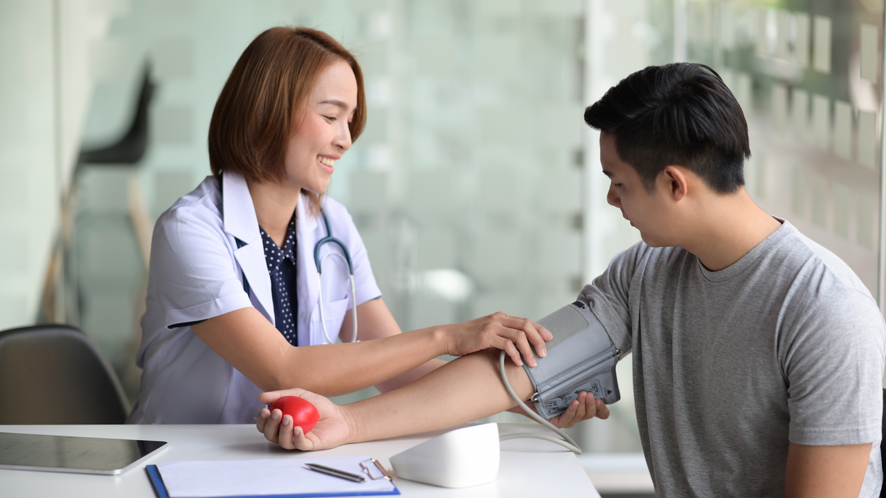 A man getting his blood pressure checked