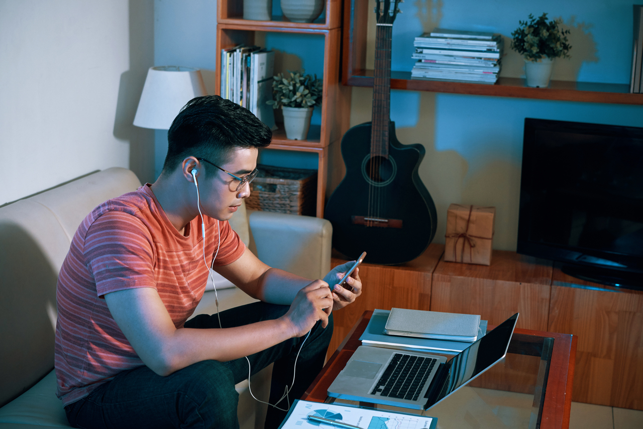 A young man working from home