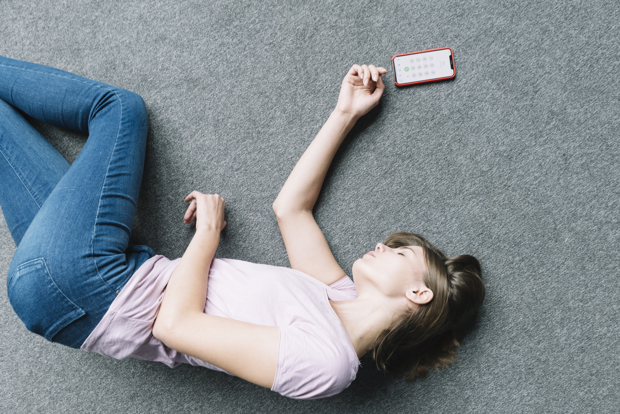An unconscious woman having a seizure