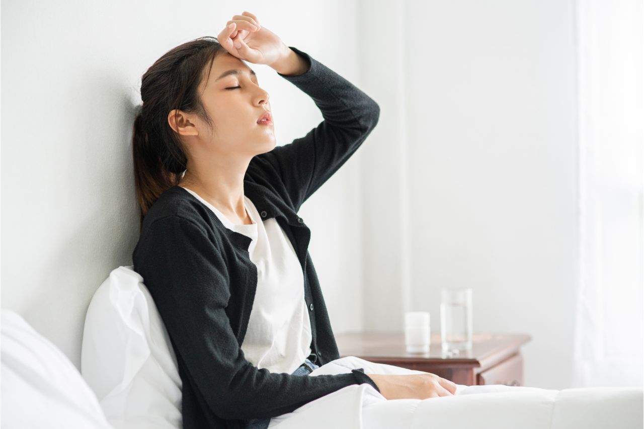 Woman experiencing nausea