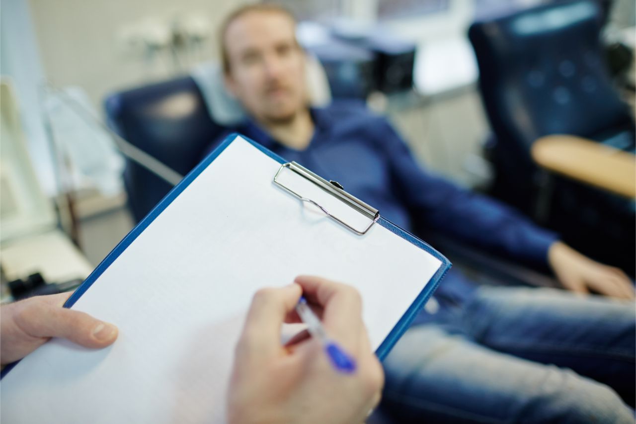 A nurse examining patient after stem cell therapy